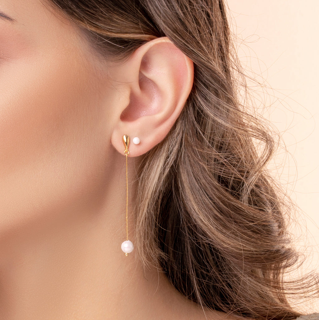 Boucles d'oreilles pendantes avec perle